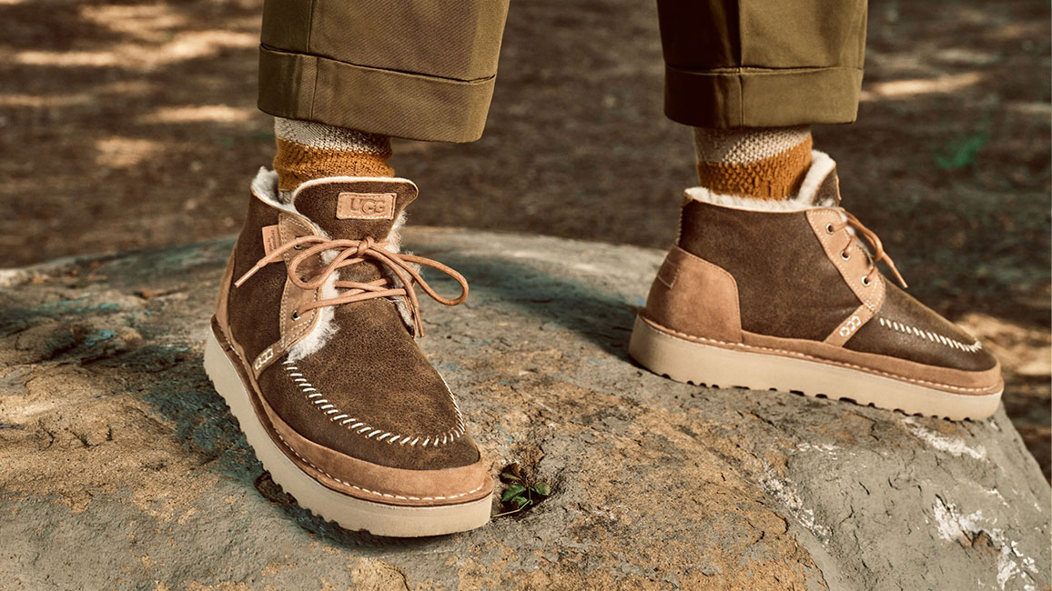 a pair of boots on a rock